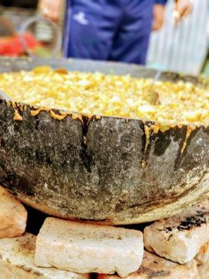 Dum Aloo prasad being cooked for the Bhandara for the devotees