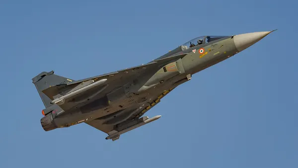 Indian Defence Minister Rajnath Singh flies HAL Tejas