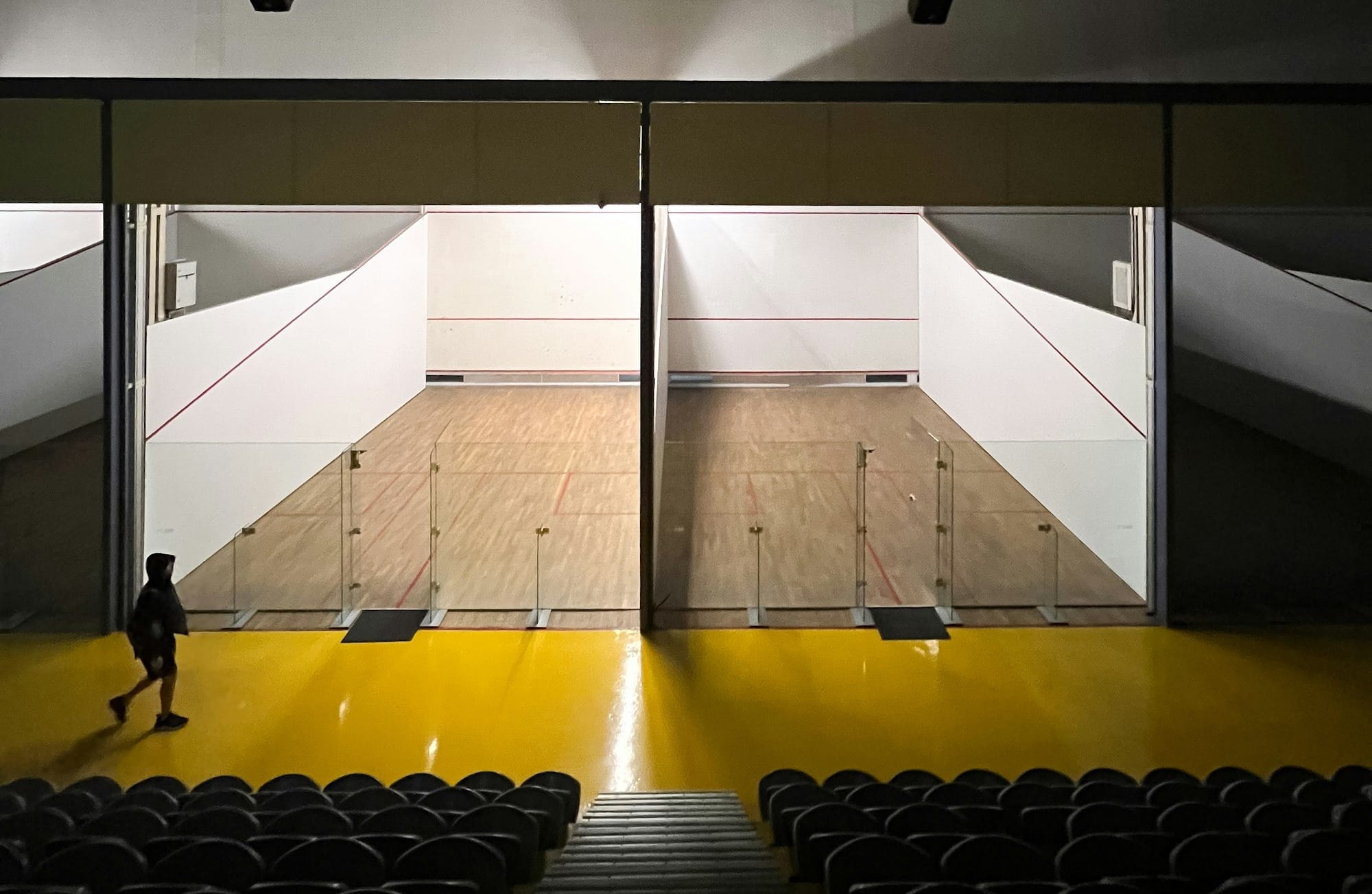 a person standing in front of an empty stage