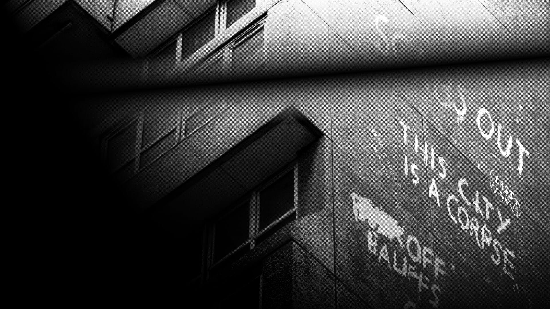Graffiti on a brick wall reading This City Is a Corpse in Signet City