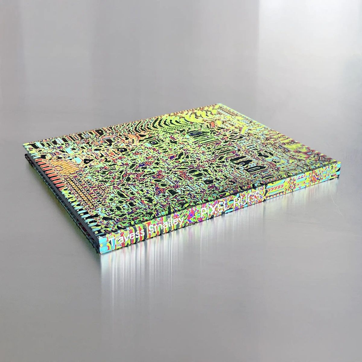 A fluorescent pixel-grid rug composition from Travess Smalley's Pixel Rugs