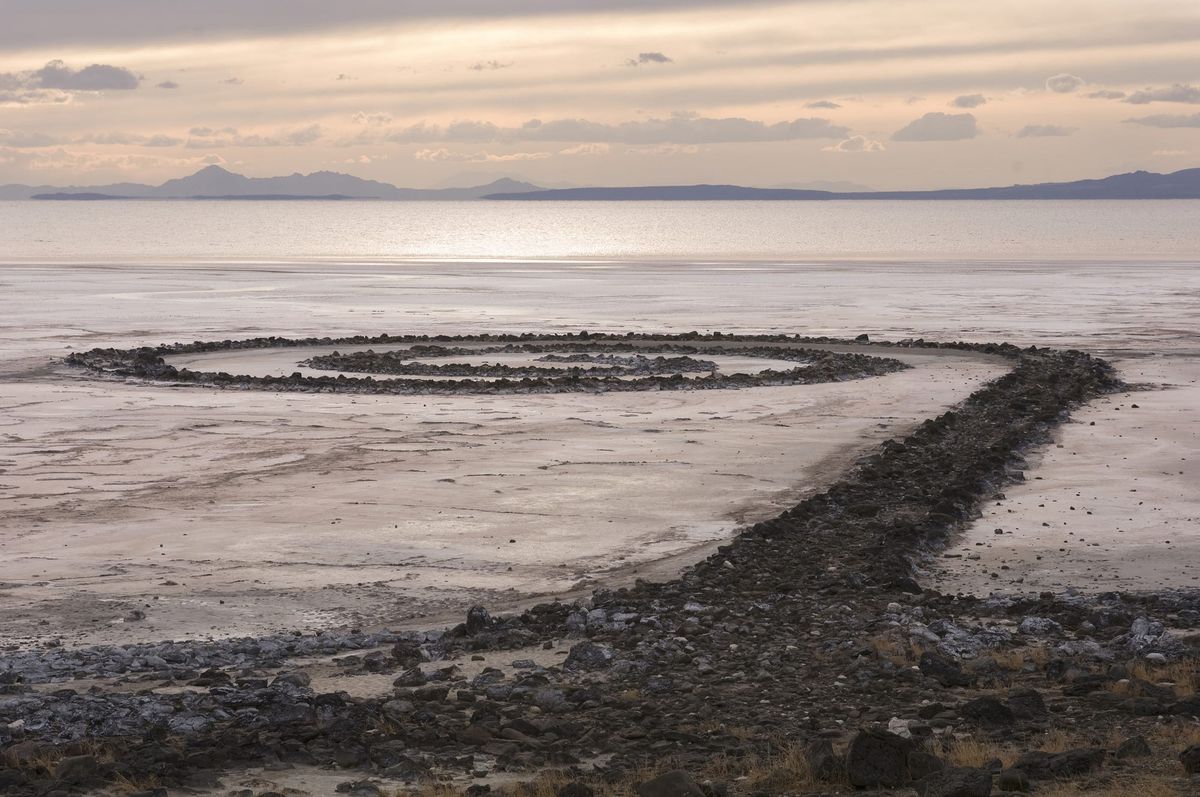 Robert Smithson's Spiral Jetty coiling out into the pale shallows of the Great Salt Lake.