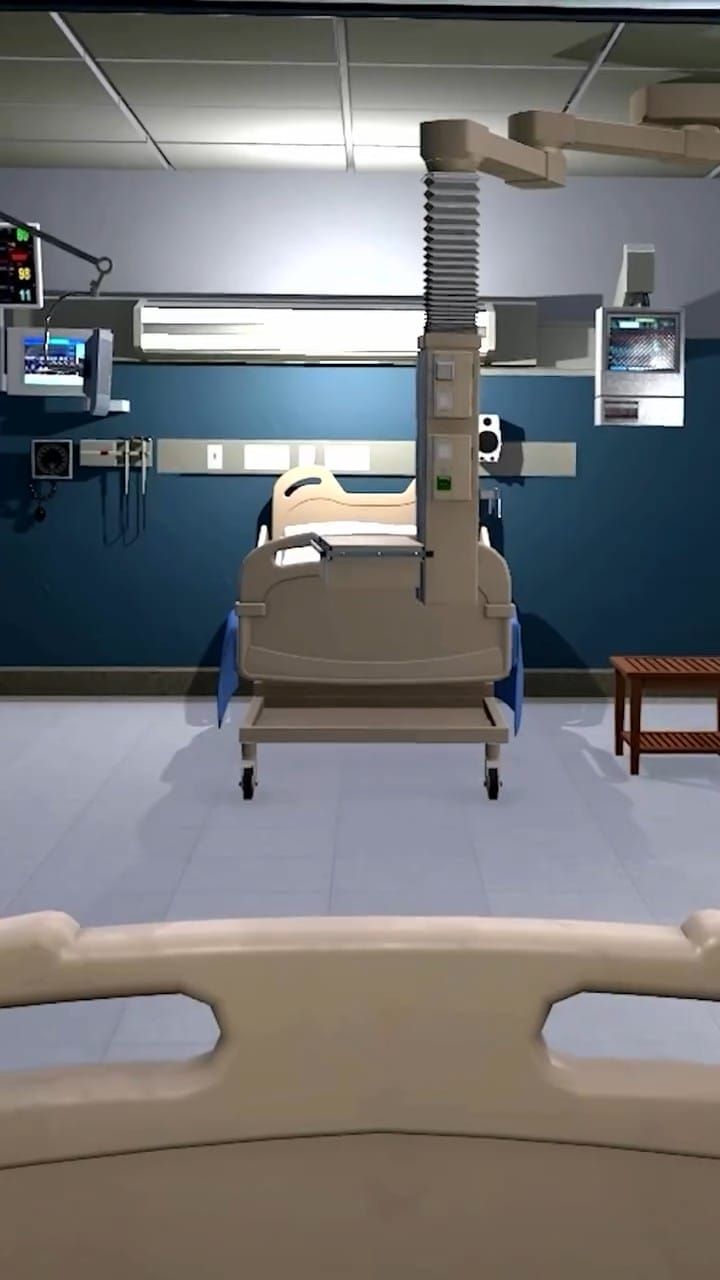 First-person view of an empty hospital bed in a video game hospital room