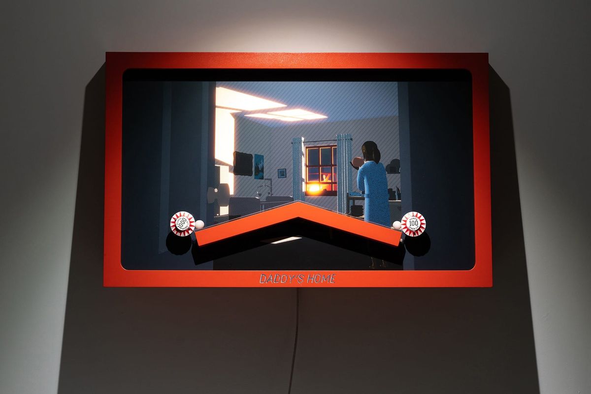 A red shadowbox pinball sculpture with an inverted V track over an illustrated nursery scene, a woman at the window with a baby