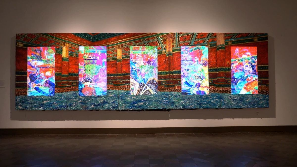 Five bright video panels of The Bathhouse installed on a dark gallery wall