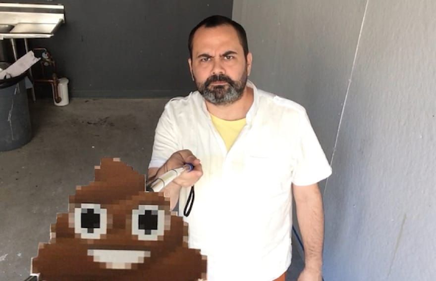 A professor attached emoji to selfie sticks to help us combat vanity
