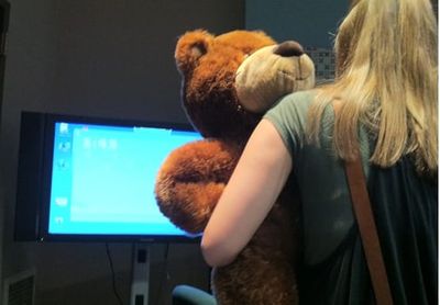 The game that asks you to hug a real-world teddy bear is here. It is proof that the world is not awful.