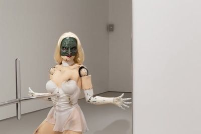 Watch in total revulsion as a female robot grind-dances
