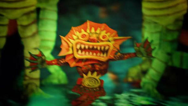 An orange, many-toothed creature with sun-ray spikes stands in a green underwater thicket.