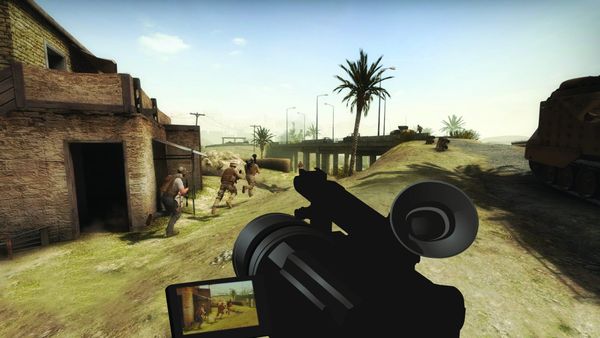 A simulated Middle Eastern street seen down the barrel of a weapon