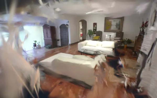 A dreamlike reconstructed room with a bed and sofa, edges blurred, from Fantasy Lane