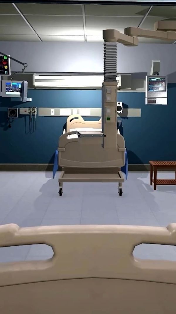 First-person view of an empty hospital bed in a video game hospital room