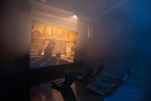 Fog fills Chemist Gallery in front of a screen showing dmstfctn’s game-engine animation Big things coming