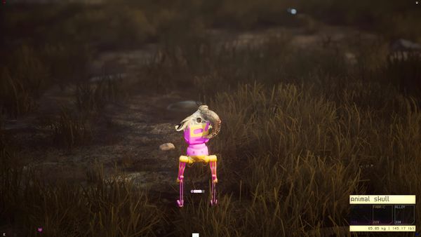 A small robot glowing pink stands in a dark field of tall grass