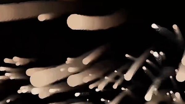 Streaks of glowing particles on a black background from a Processing 5 compute shader demo
