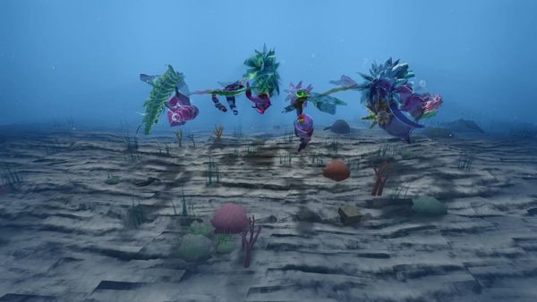 Colorful artificial organisms from Ira Greenberg’s Protobyte Phylogeny scattered across a pale textured plain