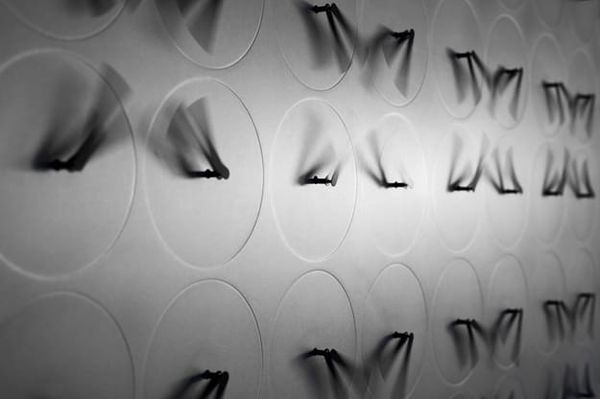 Watch this beautiful installation turn a digital clock into an analog one