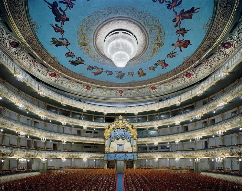 Larger-than-life opera house photographs overwhelm the senses