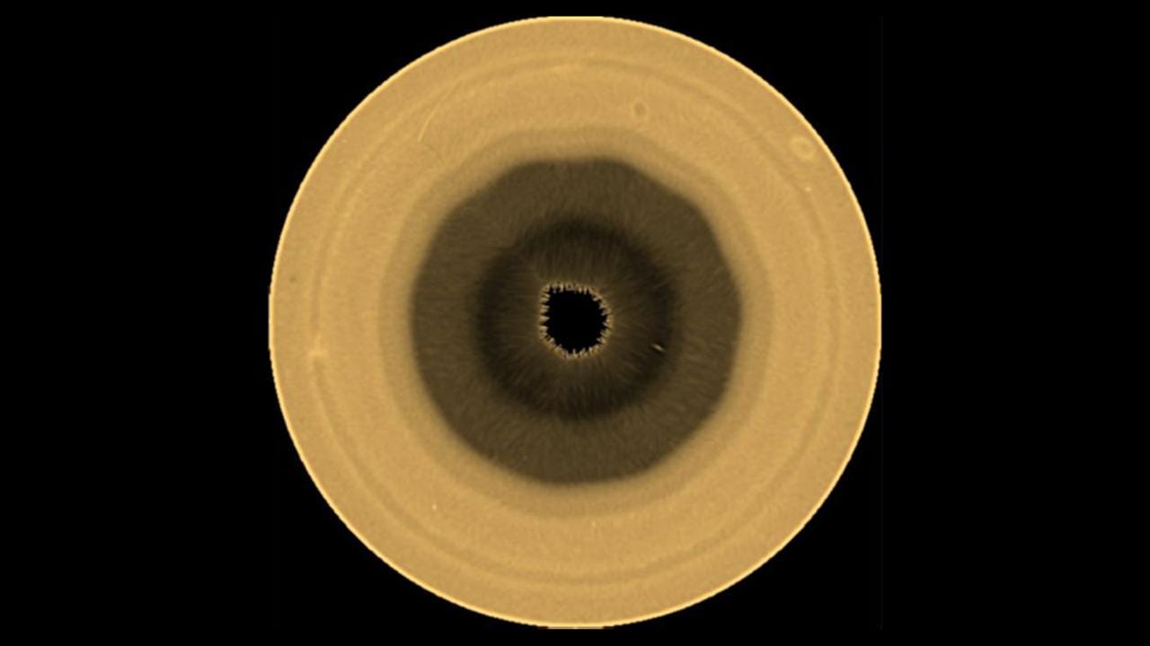 Hubble Reveals a 10-Sided Wave Taking Shape Over Saturn's South Pole