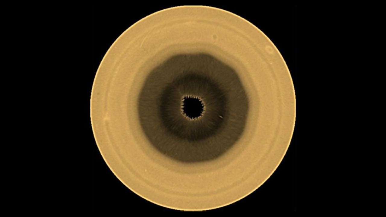 Hubble Reveals a 10-Sided Wave Taking Shape Over Saturn's South Pole