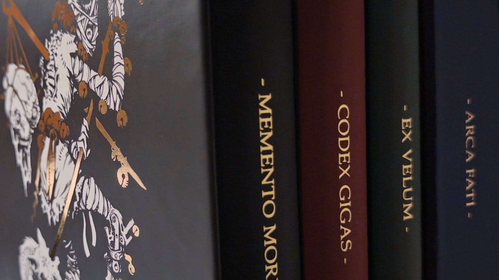 Memento Mori core book, Codex Gigas, Ex Velum, and Arca Fati books in slipcase.