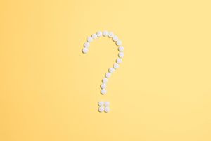 pills fixed as question mark sign