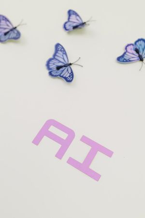 purple butterflies on white surface