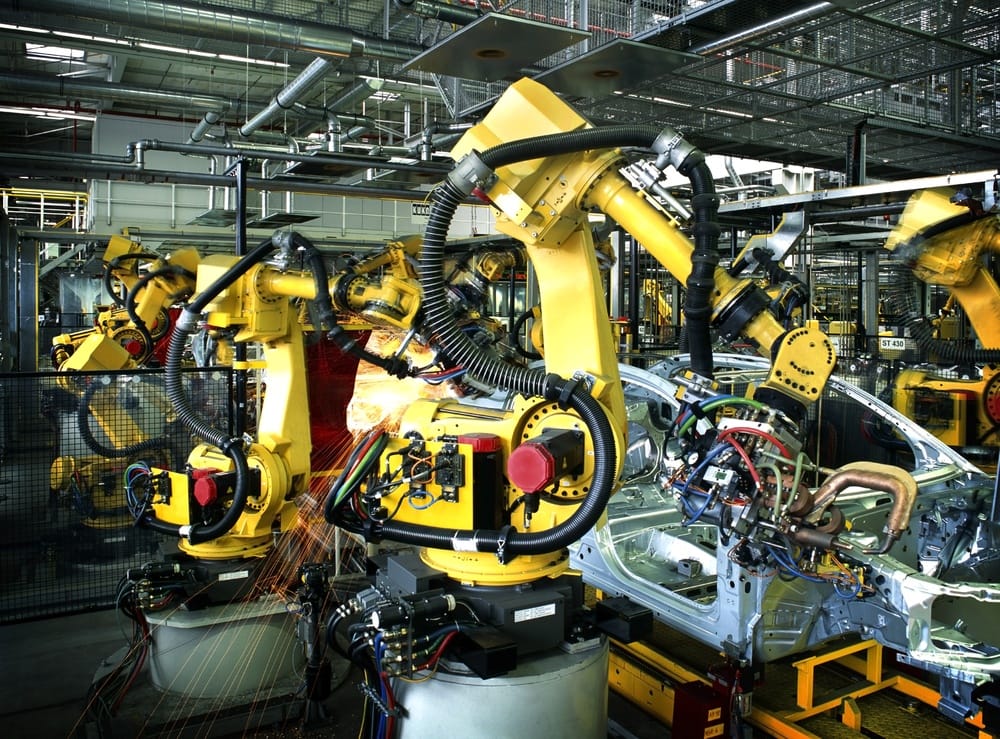 welding robots in a car manufactory