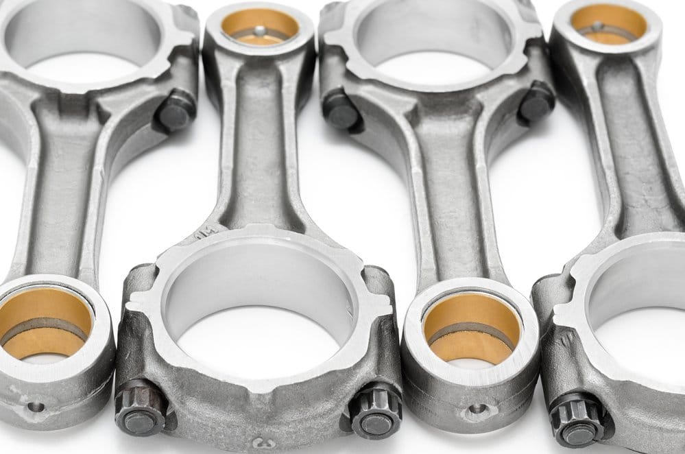 four connecting rods - spare parts of a disel engine