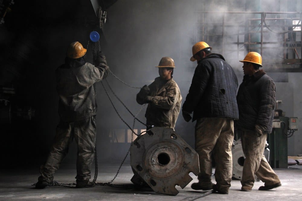Workers in the iron and steel enterprise production line, north china