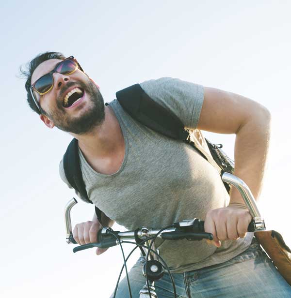 enthusiastic man on a bike