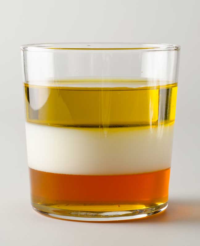 Immiscible liquids in separed layers: milk, baby oil