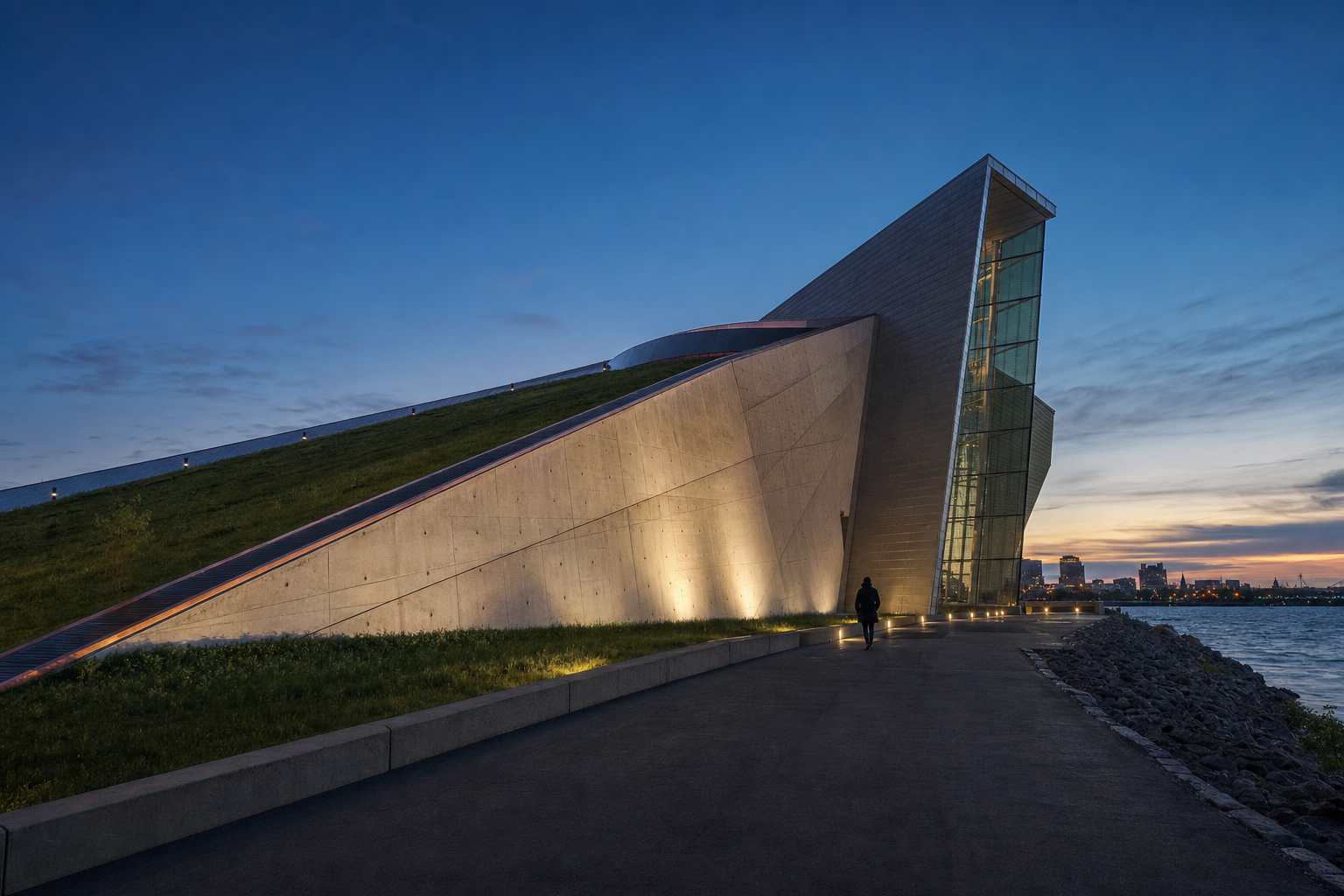 The Canadian War Museum's grass roof and angled concrete exterior at twilight in Ottawa.