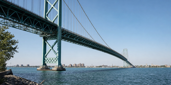 Illustrative view of the Ambassador Bridge spanning the Detroit River.