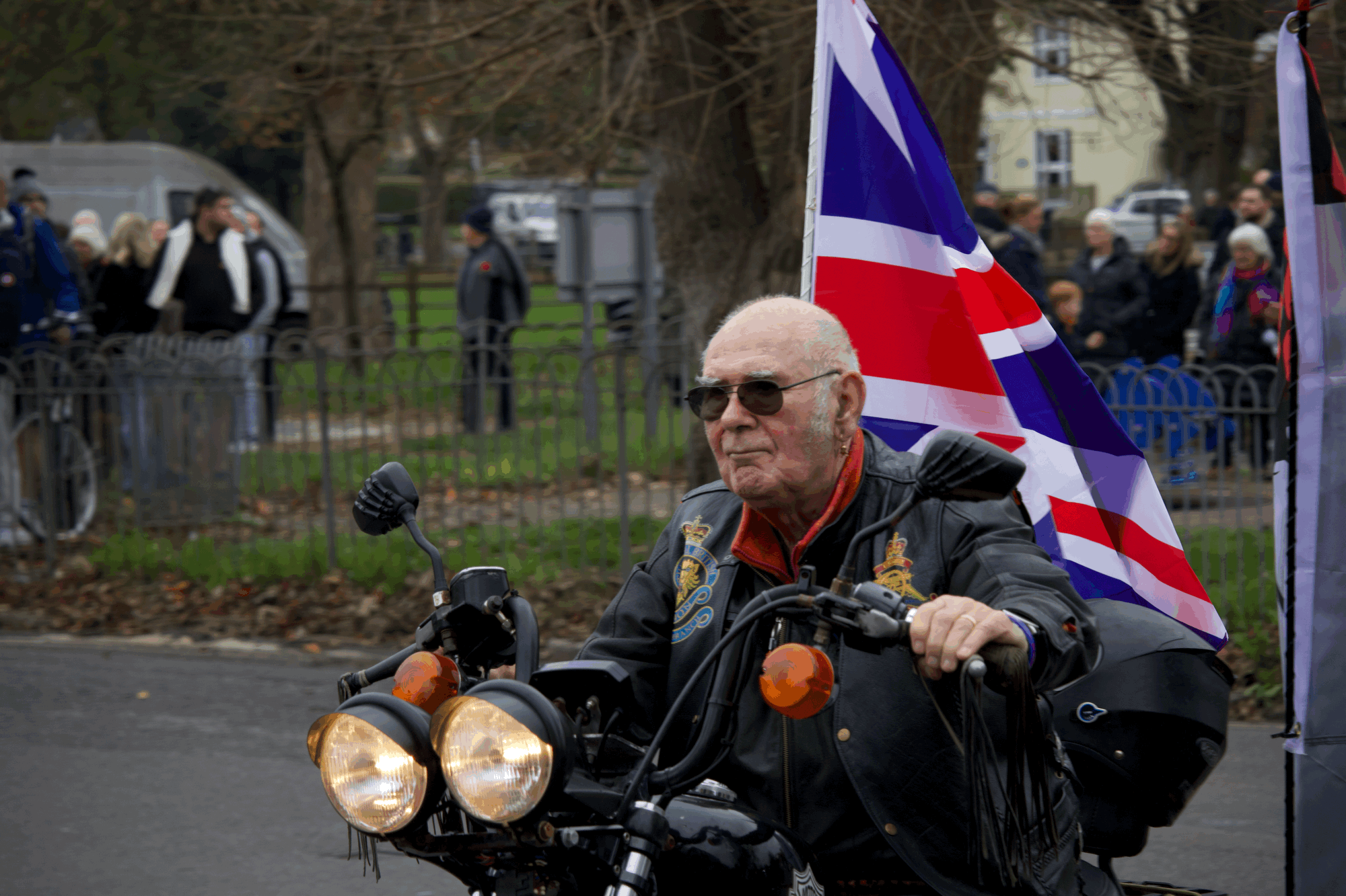 A Brighton biker rides in the Remembrance Sunday parade in Southwick, Sussex. 
