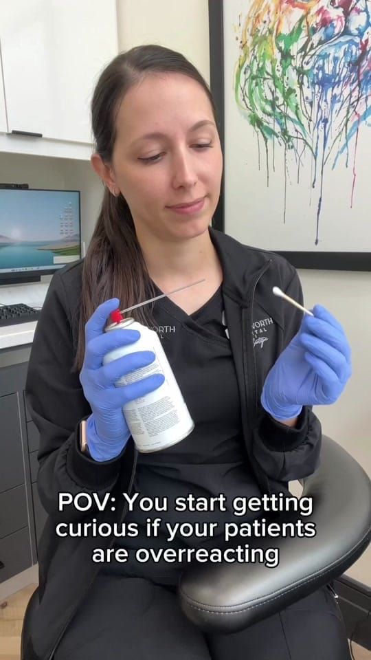 A Longworth Dental Courtice hygienist holding an air syringe with a mischievous look, with on-screen text reading: POV: you start getting curious if your patients are overreacting.