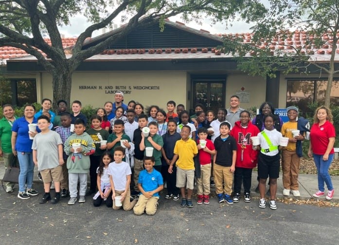 A group of people posing for a photo

AI-generated content may be incorrect.