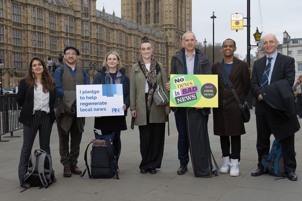 The PINF team outside parliament