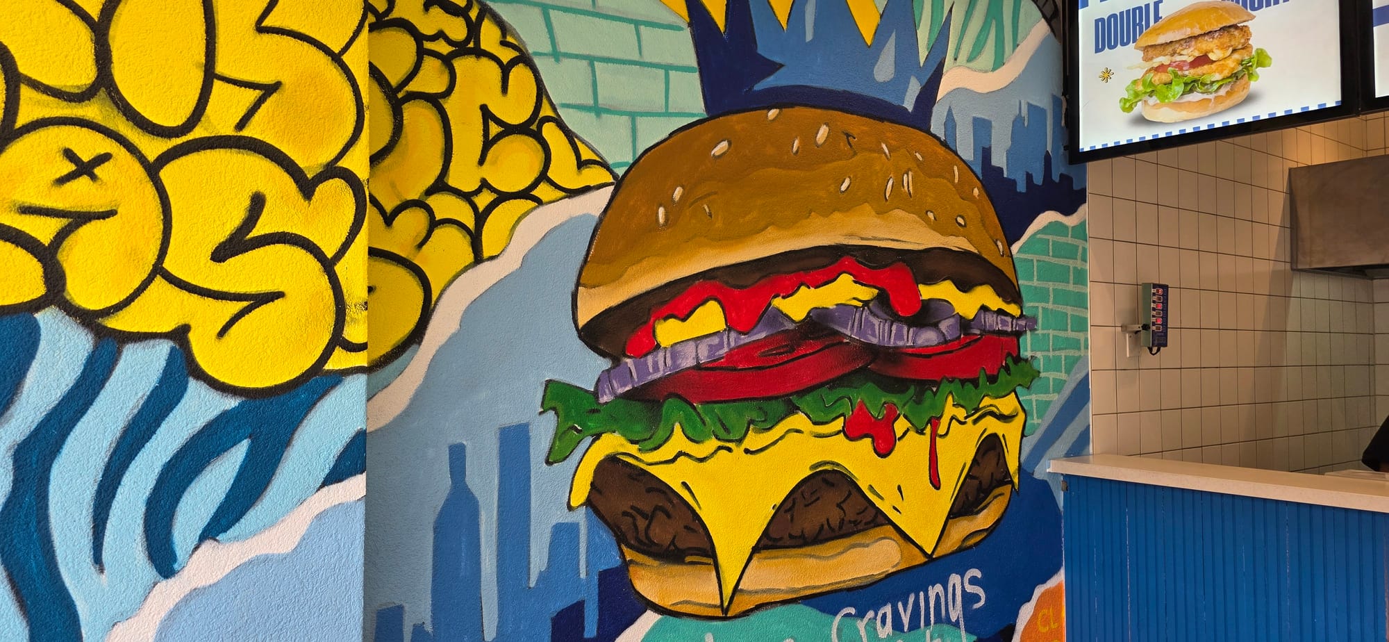 Un graffiti à l'intérieur du fast-food Classic