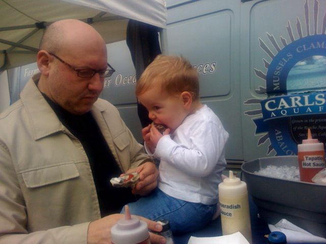 Kate and Daddy Eating Raw Oysters