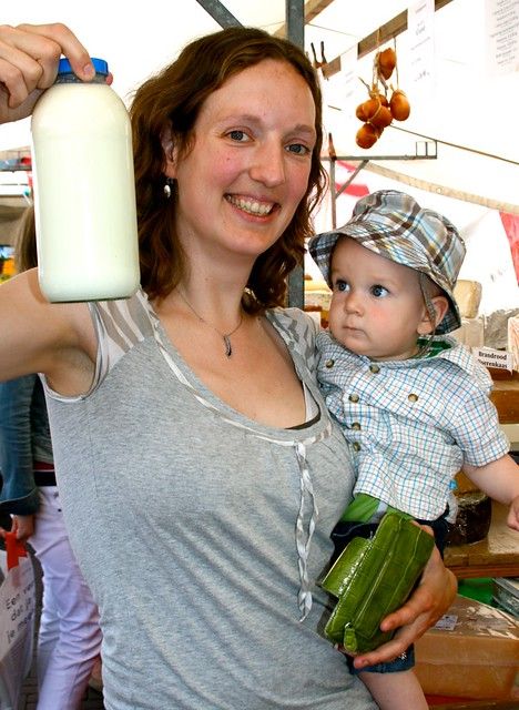 Buying raw milk at the farmer's market in Holland