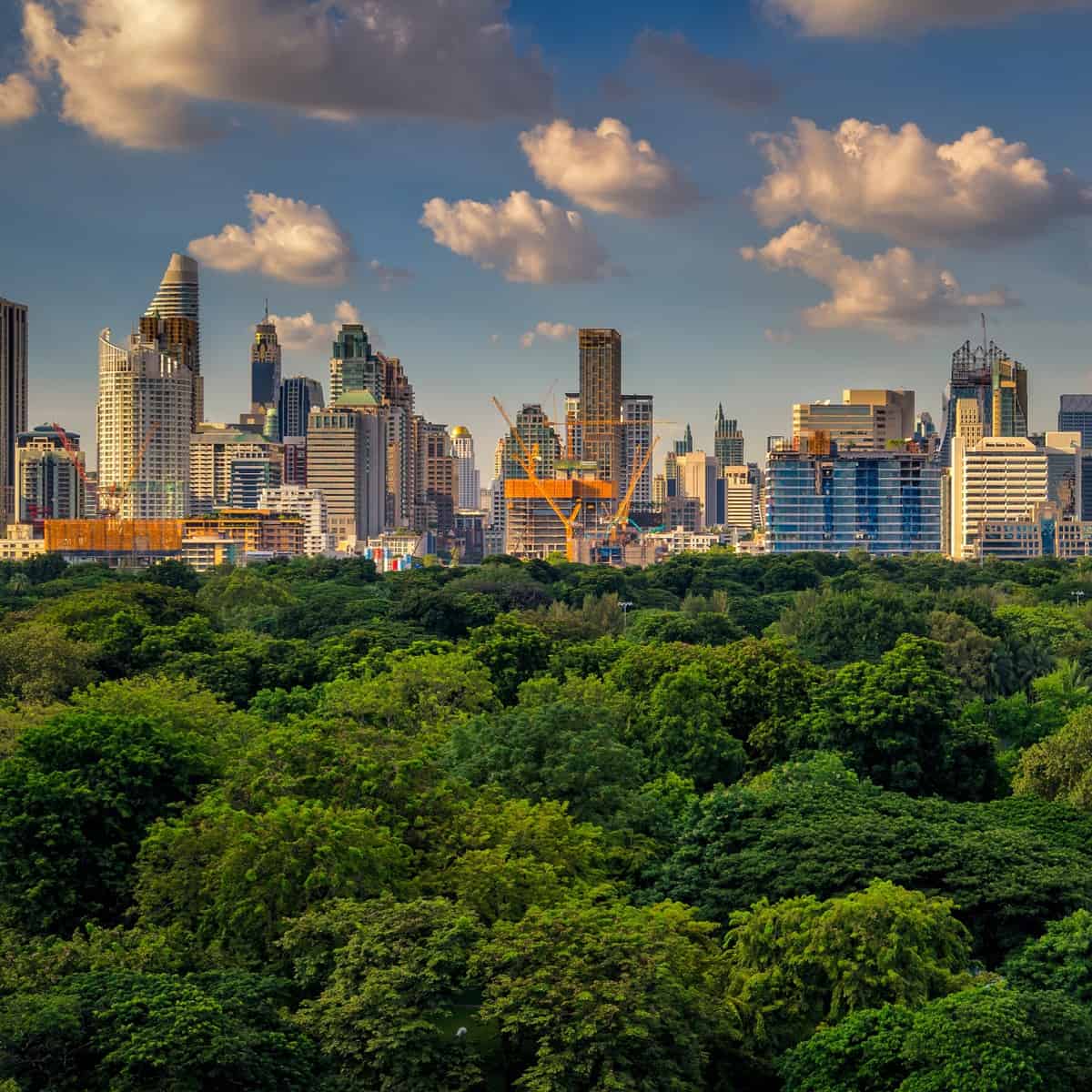 Sunset in Bangkok with a city skyline on the horizon