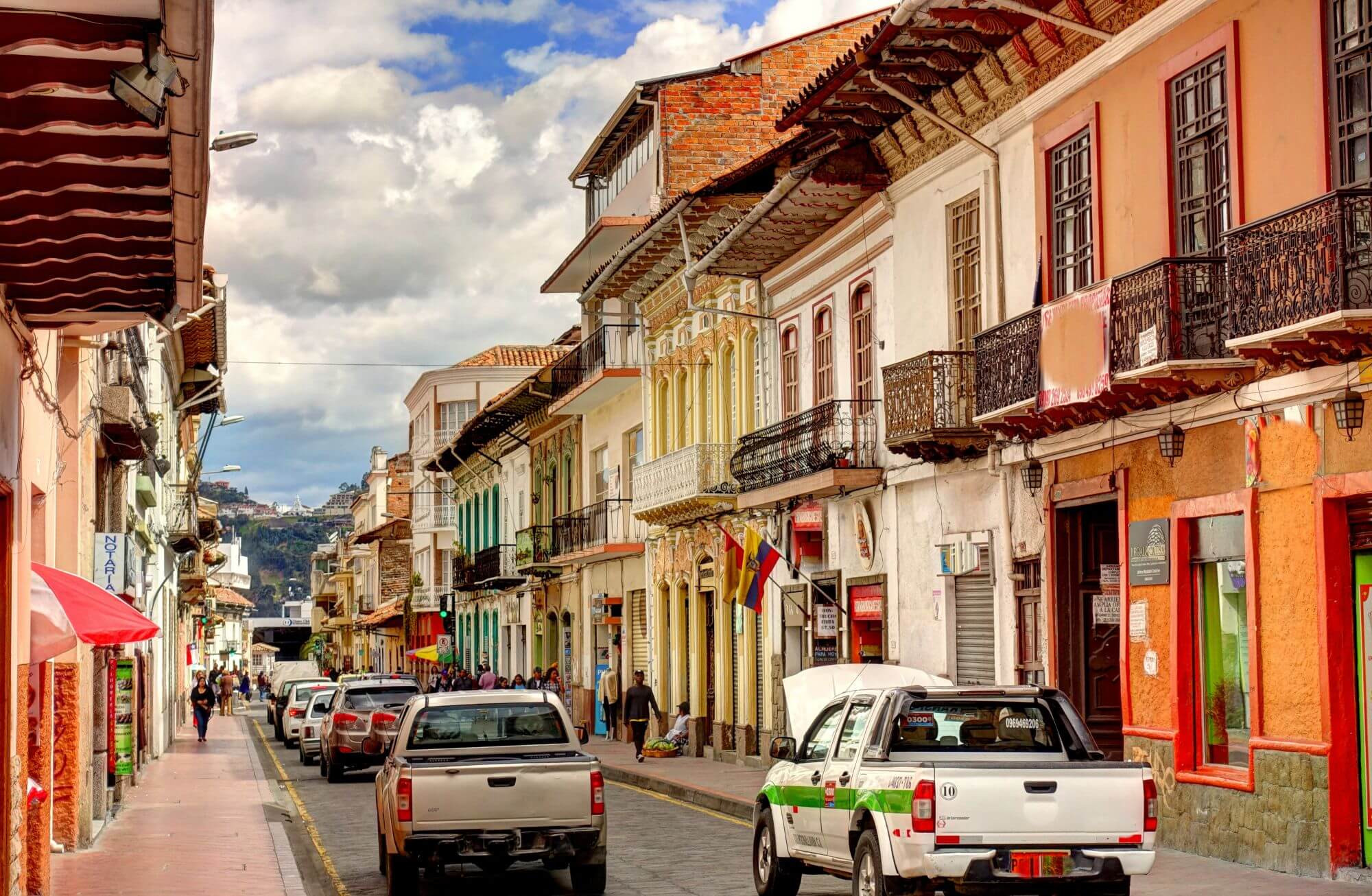 A historical street lined with colorful hoses