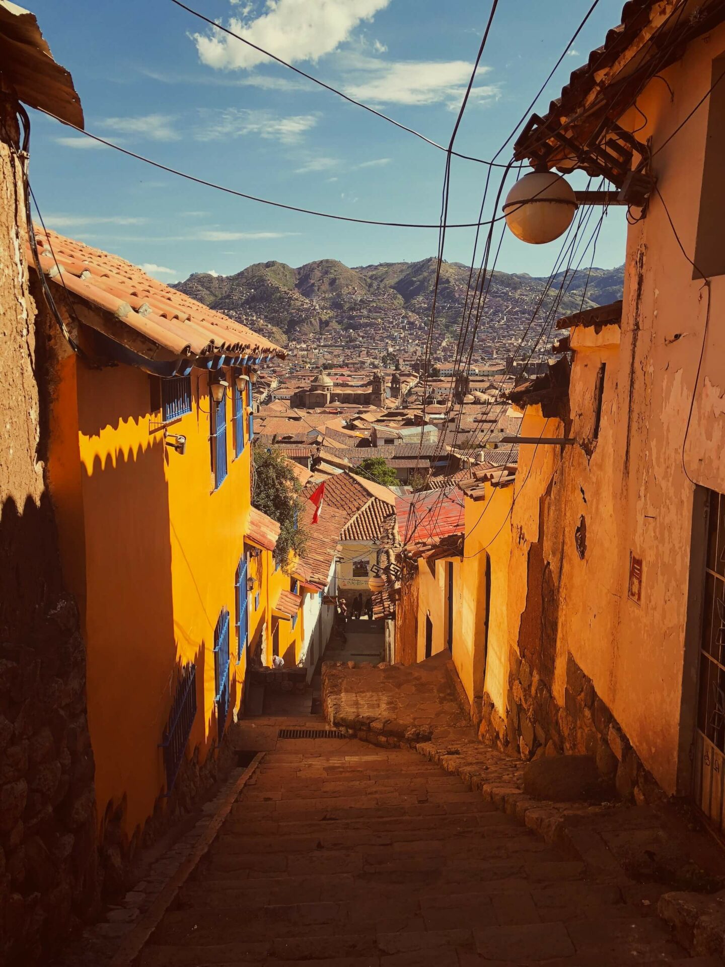 An old street of Cusco City with the mountainview
