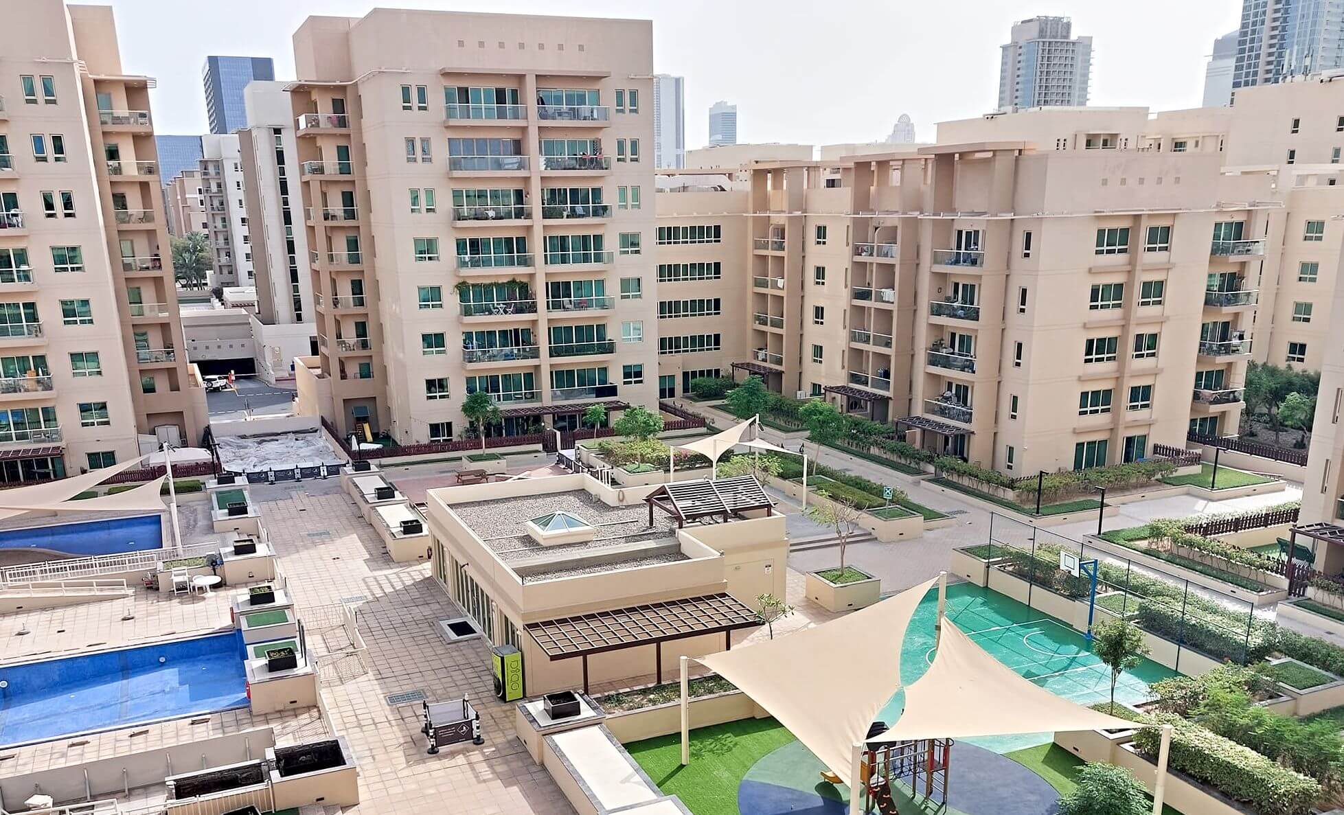 A view of a residential area The Greens in Dubai - apartment buildings and recreational facilities 