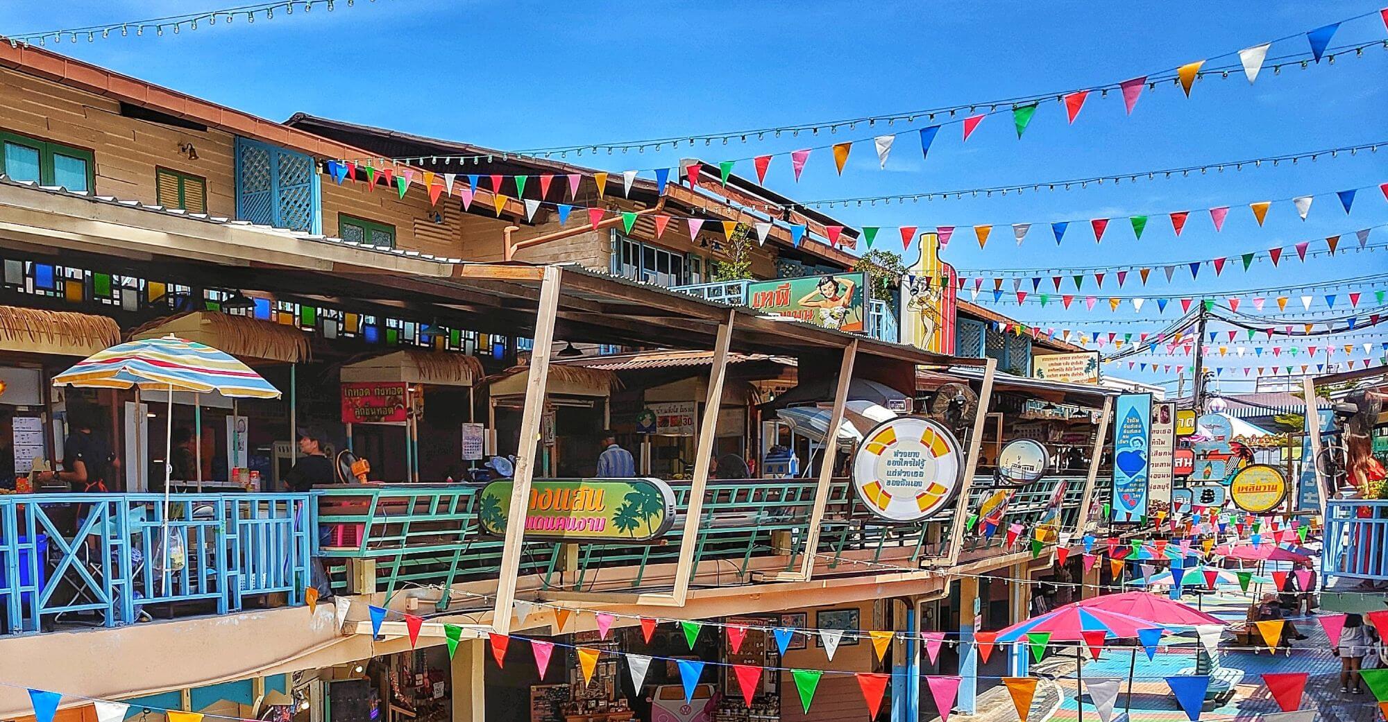 A busy tourist street in Hua Hin: restaurants and cafes along a street