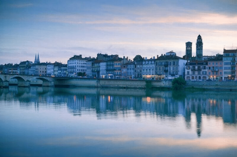 The town of Autun in Cozy towns of Saône-et-Loire - a river bank