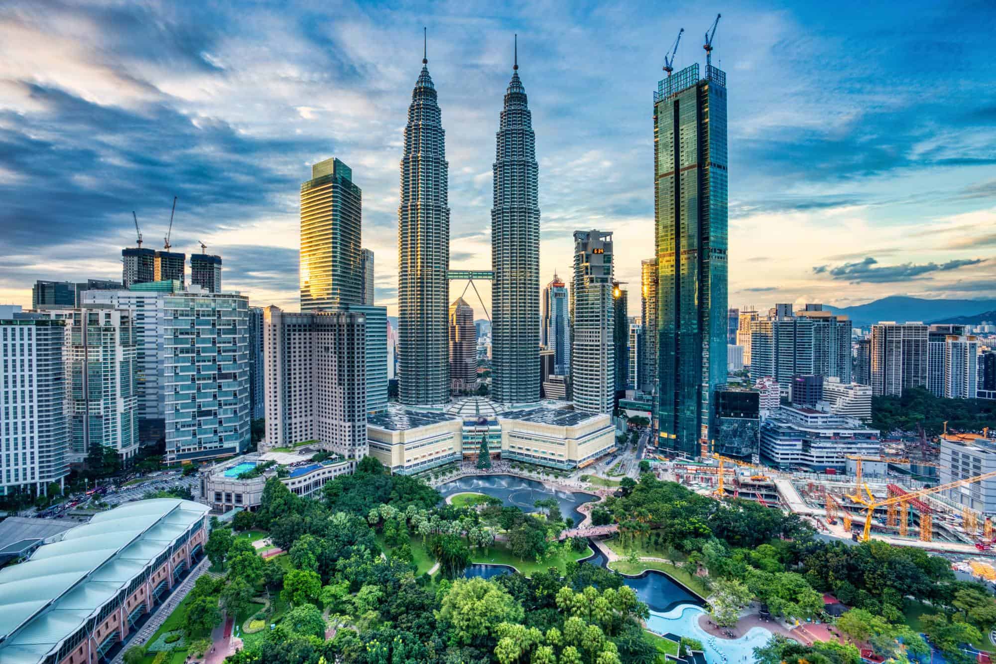Kuala Lumpur impressive cityskape with skyscrapers and green parks