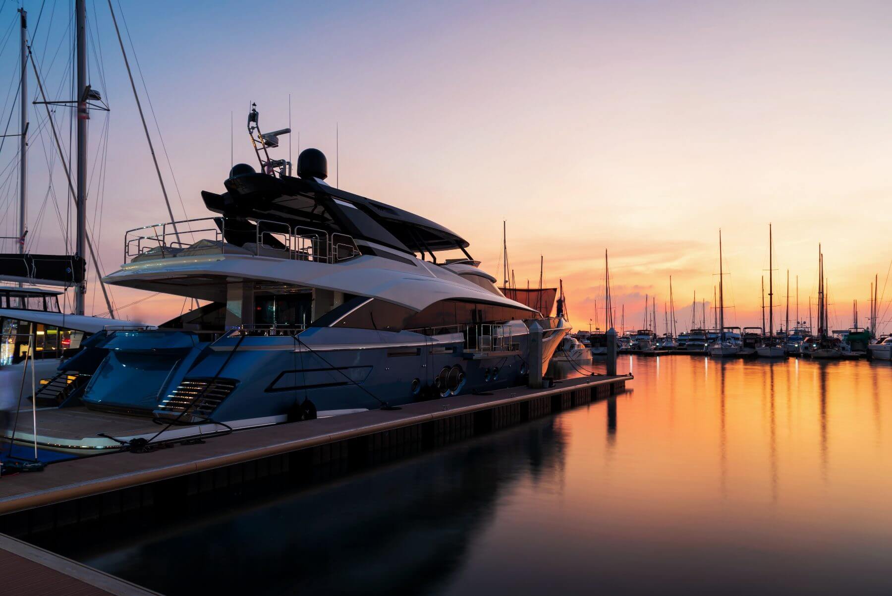 Pattaya marina at the sunset with luxury boats and yachts