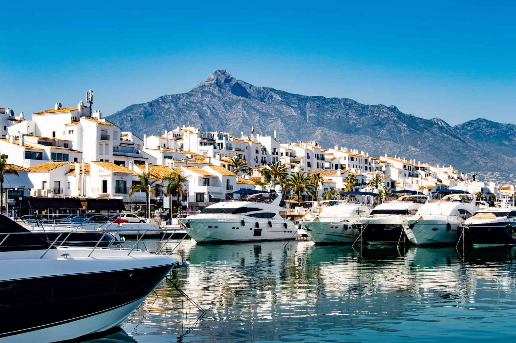 Marbella Marina - expensive yachts and boats moored along the marina